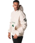The Wild Collective Cream Boston Celtics Hoodie | Trendy Leather Jackets